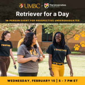 Smiling students in black and gold walking on USG campus